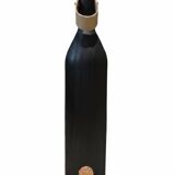 Burnt wood vase for dried flowers, leather and brass handle.