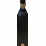 Burnt wood vase for dried flowers, with a leather and brass handle.