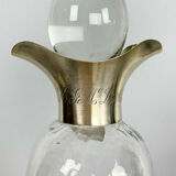 Blown glass carafe with silver frame