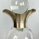 Blown glass carafe with silver frame