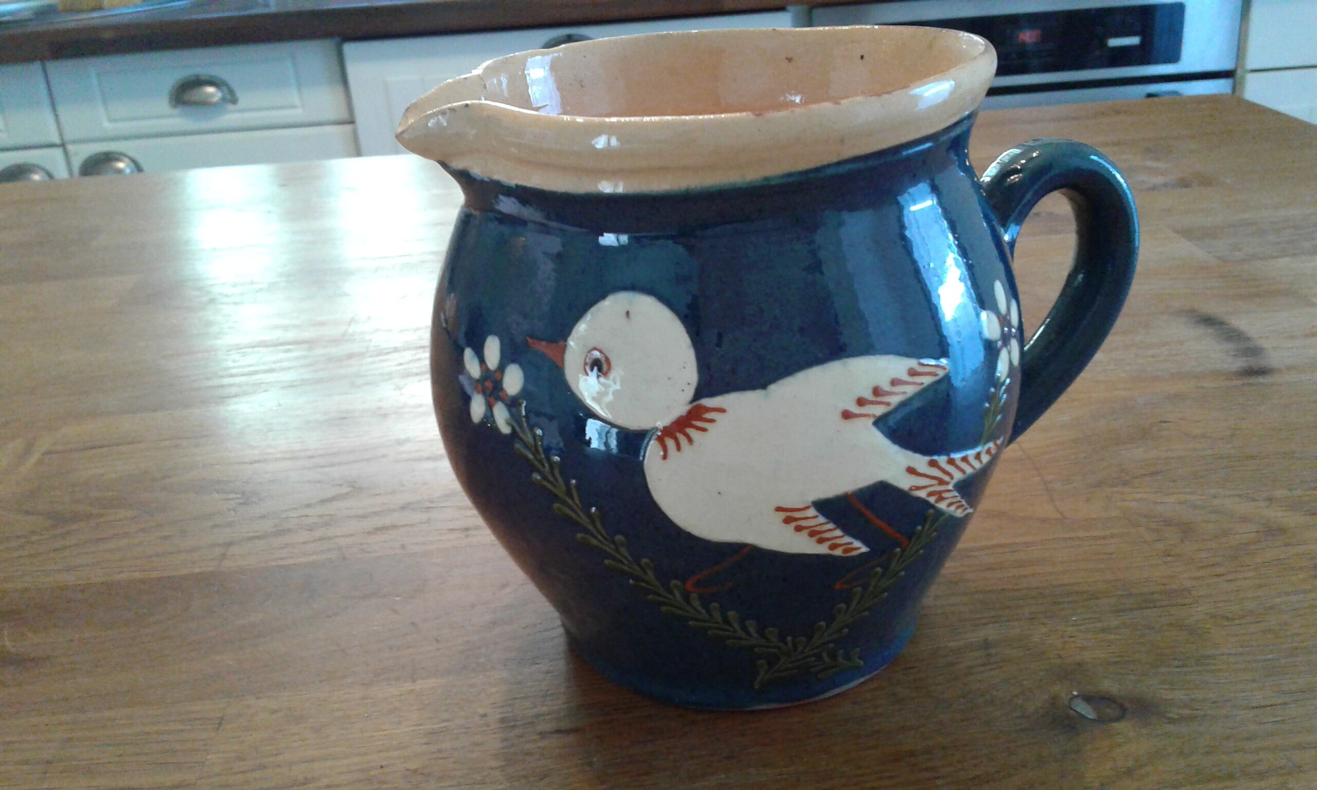 Terracotta pitcher vintage bird décor