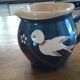 Terracotta pitcher vintage bird décor