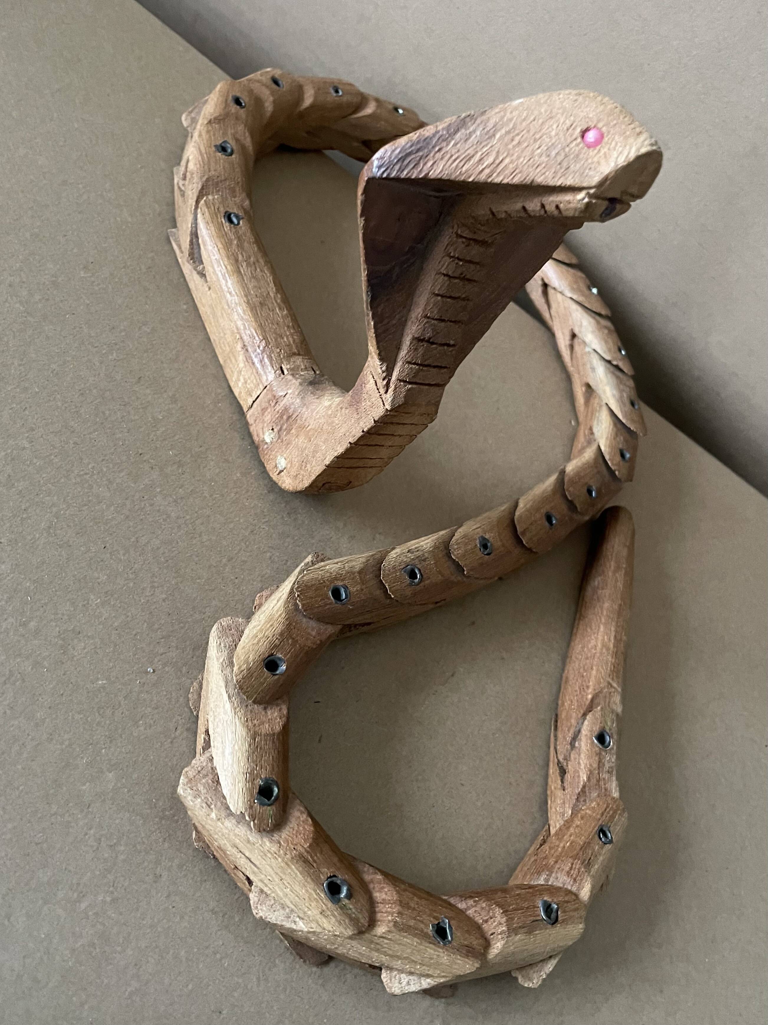 Articulated wooden snake