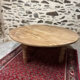 Oval coffee table in raw wood
