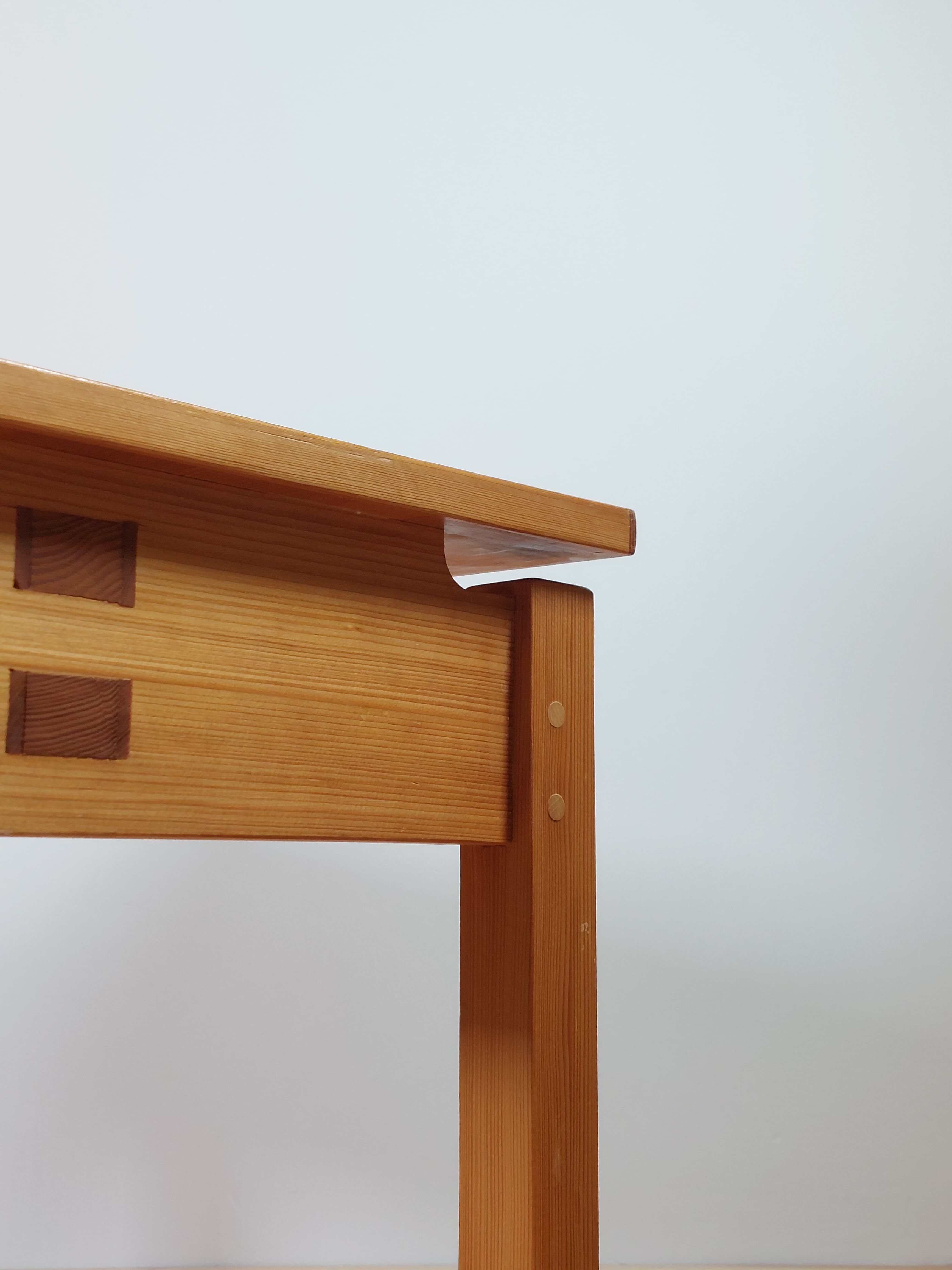 Meticulously crafted vintage pine side table, a masterpiece.