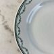 Set of 12 flat plates in Saint Amand earthenware, 22.5cm.