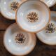 Creil & Montereau plates, ochre floral decoration, 1930s