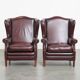Ensemble de 2 fauteuils à oreilles en cuir de vache de style anglais