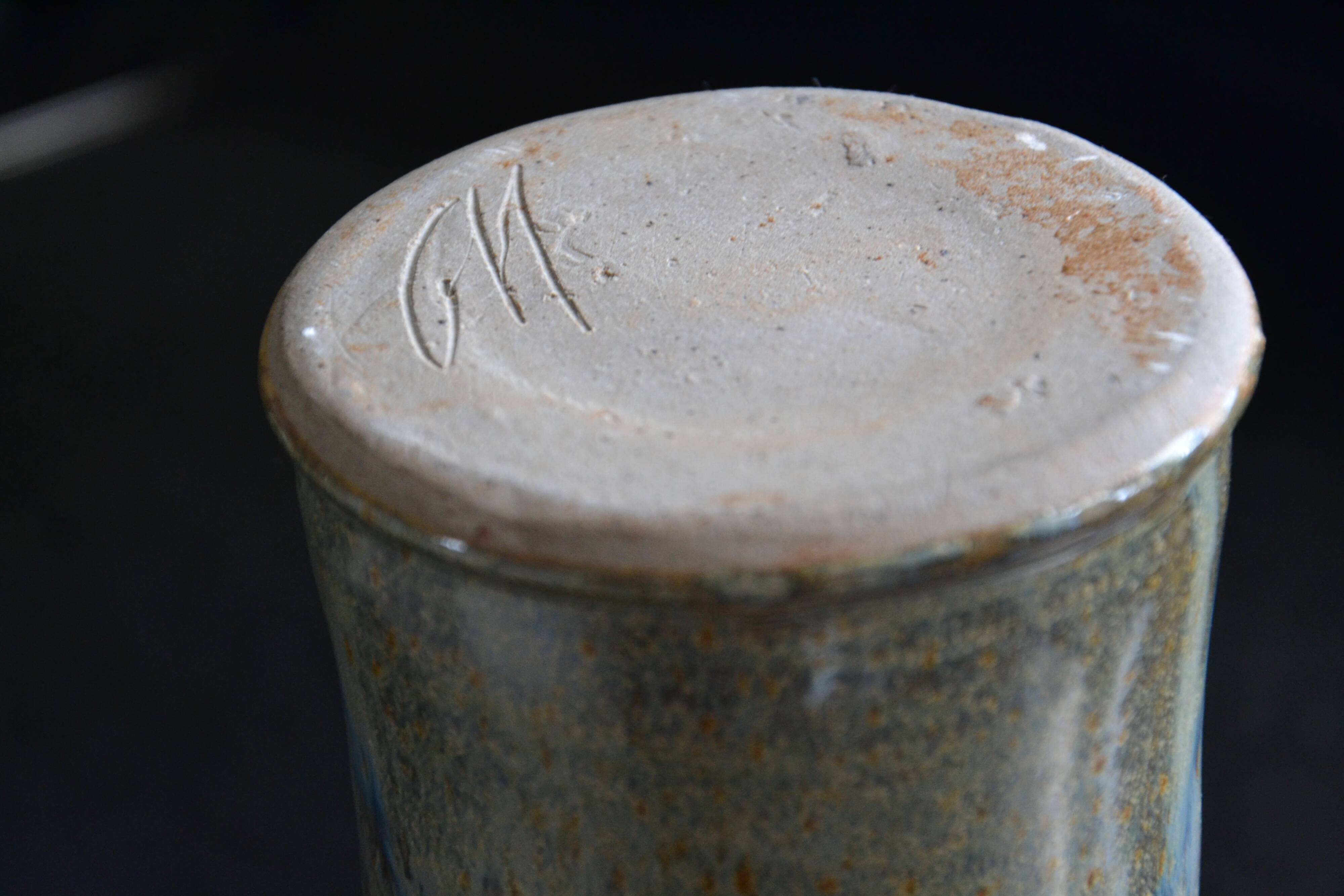 Signed chiseled and glazed stoneware roller/tube vase