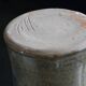 Signed chiseled and glazed stoneware roller/tube vase