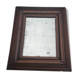 Old mirror with wooden frame