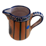 Small milk jug signed AR-H