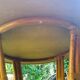 Canned rattan dining table and vintage glass