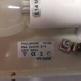 Wall lamp from Paulmann with white opal glass shade.