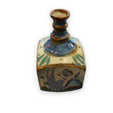 Tonala ken edwards bottle made of polychrome ceramic