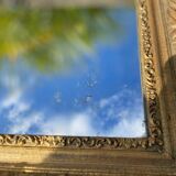 Miroir en bois et stuc doré