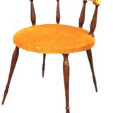 Mustard gondola armchair in the style of Helmut.