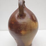 ancient water jug in vitrified sandstone, bulging avc handle