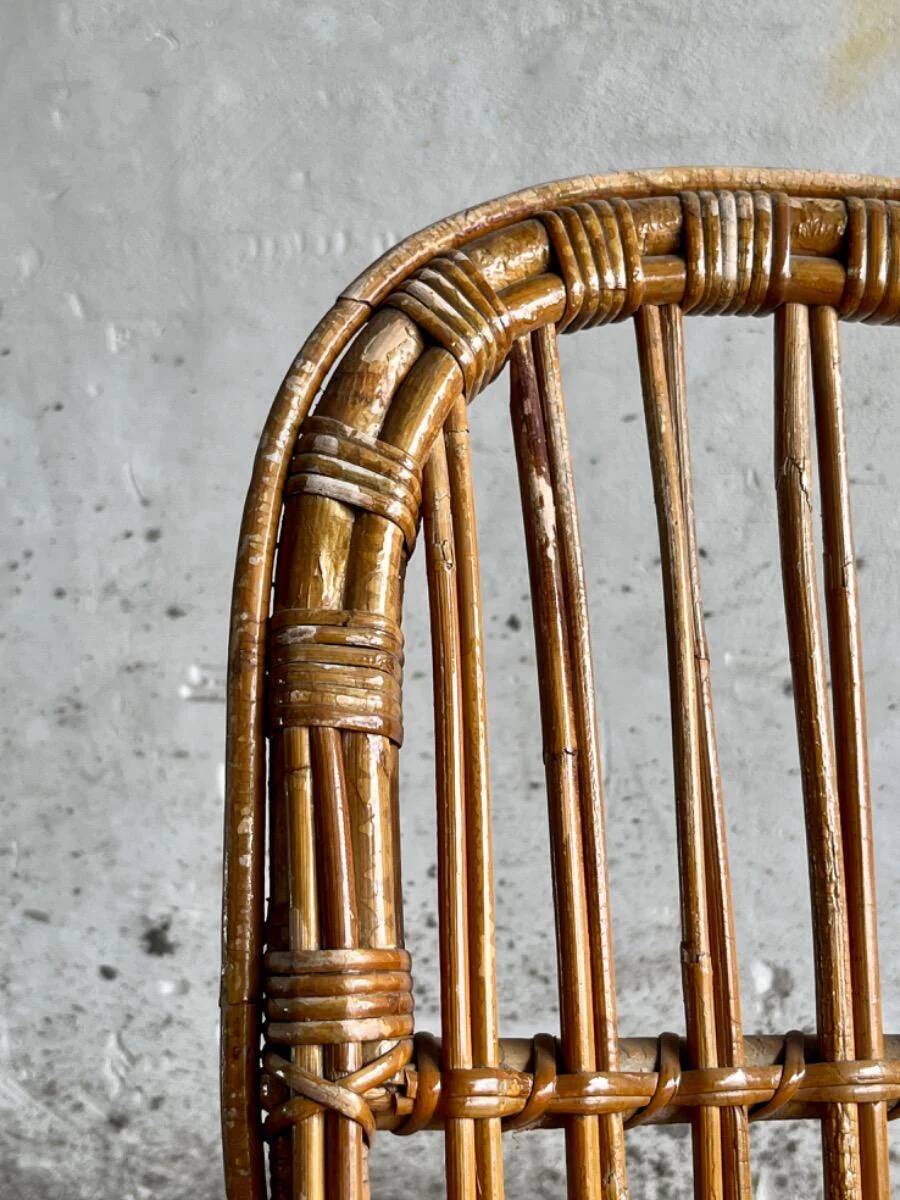 Pair of natural rattan lounge chairs with matching round table — brown mid-century boho set