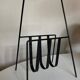 Modernist magazine rack French work 1950 in iron and brass