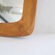 Mid-century modern sculptural wall mirror in stained oak, glass, Glas & Trä 1959