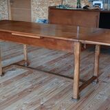 Elm farmhouse table with extensions for 6 to 10 people.