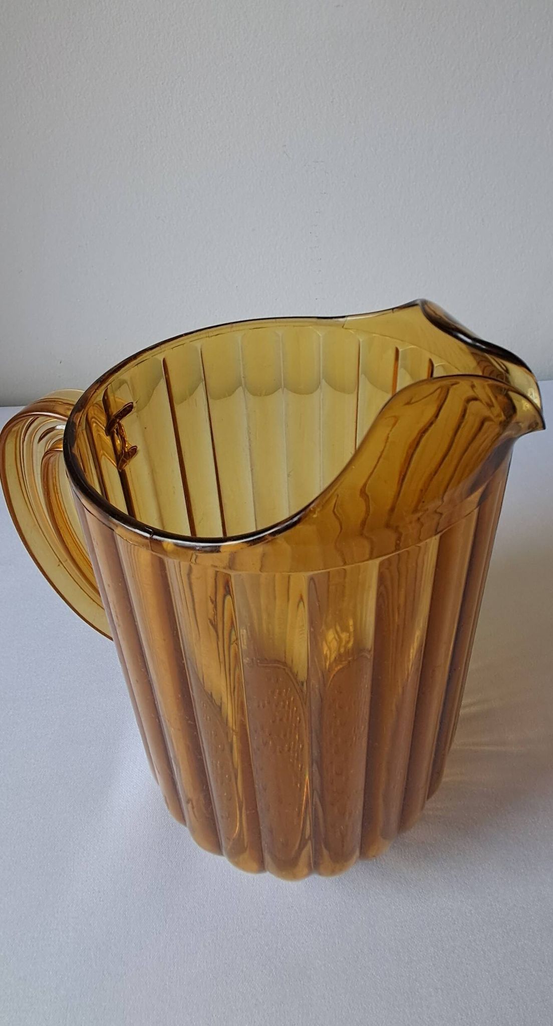 Vintage amber polycarbonate jug