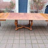 Napoleon III period walnut table from the late 19th century with extensions for 16 covers.