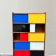Closed bookcase in Bauhaus colors by D.Rozaffy Edition Meuble Oscar, design 1960