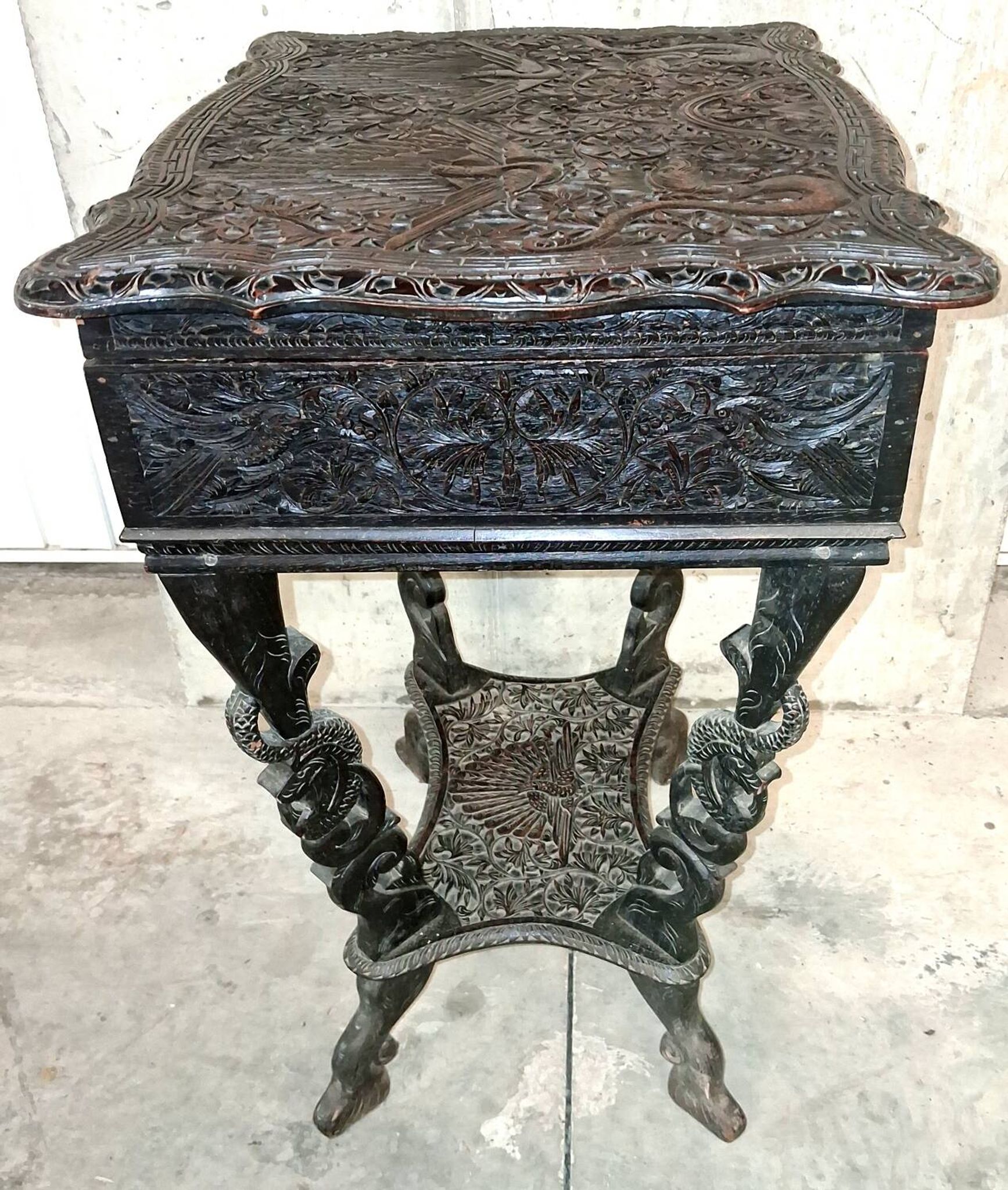 Ethnic carved wooden worker's furniture