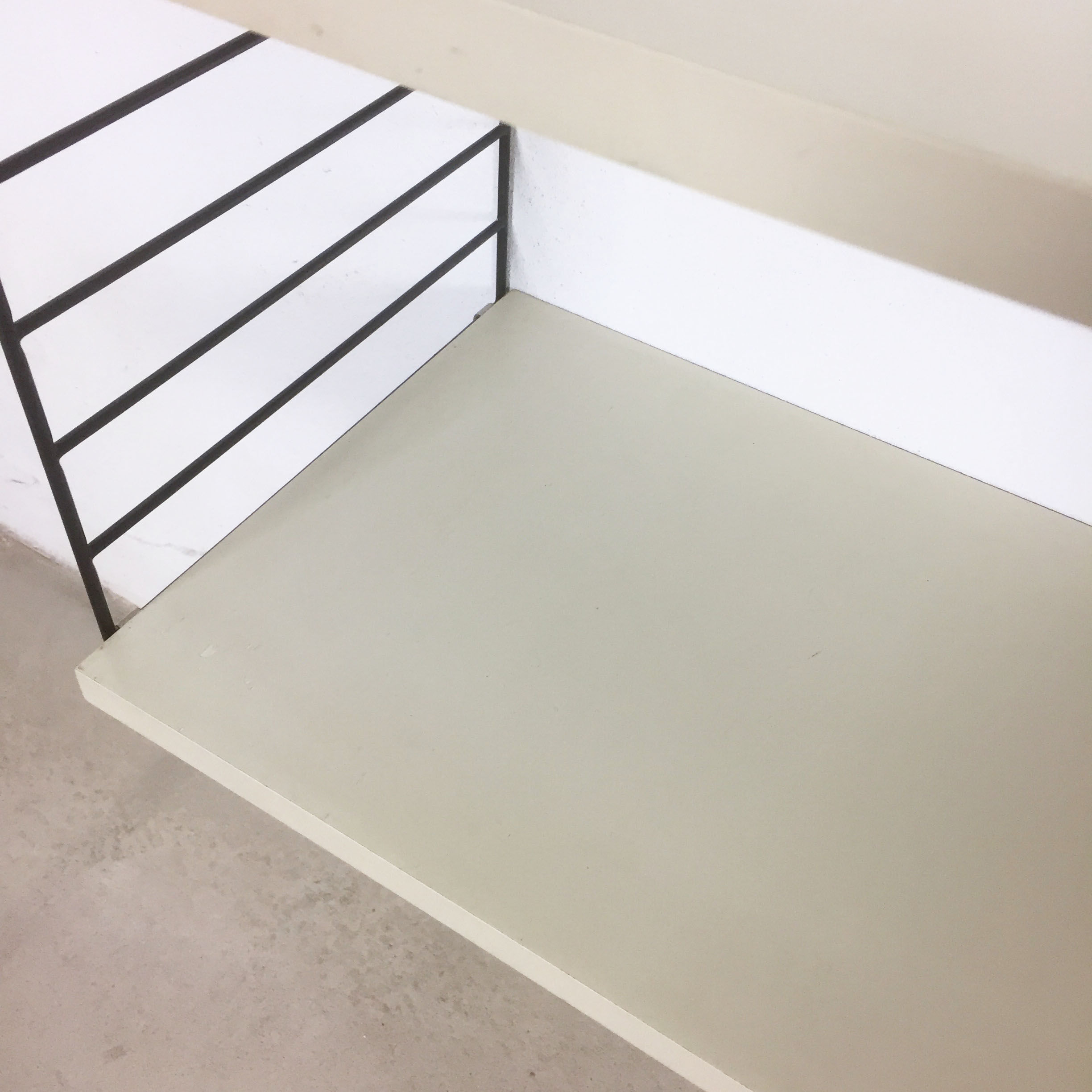 Swedish white shelves by Nisse Strinning for String of the 1960s