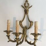 Pair of Louis XV style bronze wall sconces with 3 lights