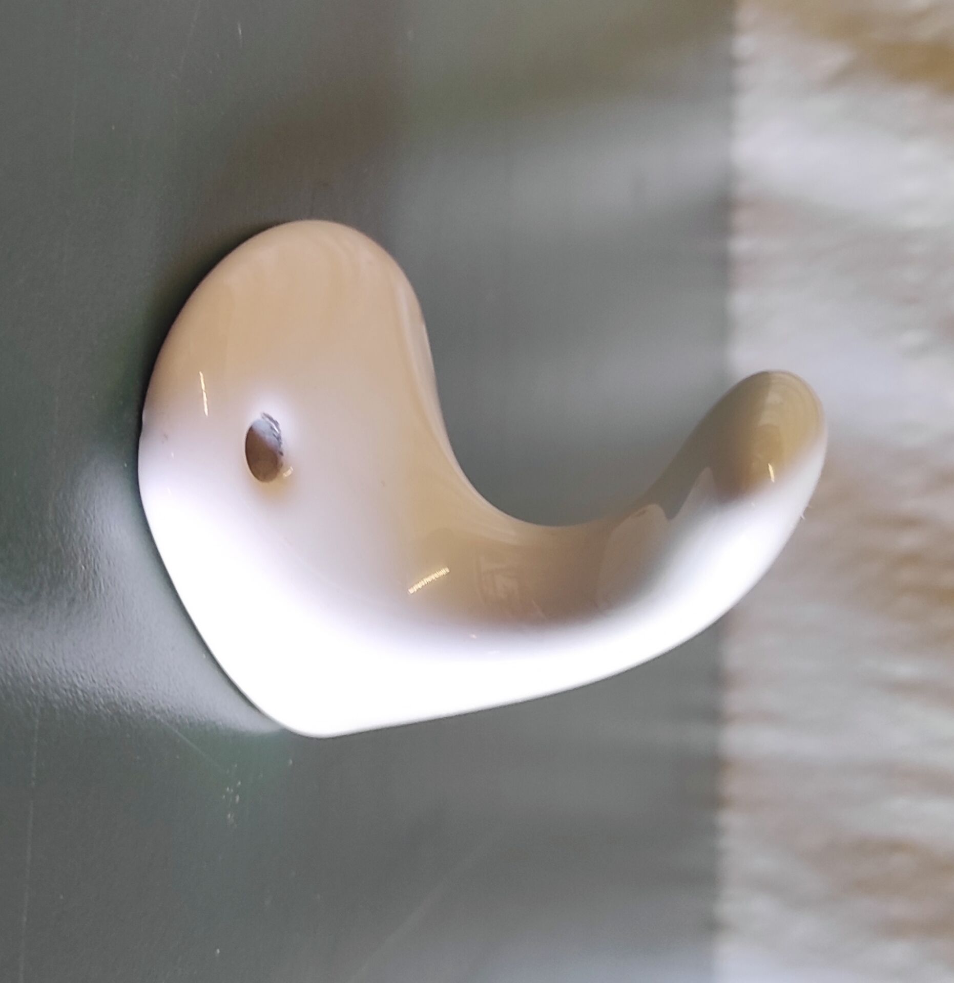 Wall-mounted coat hook in porcelain - mid 20th century
