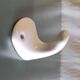 Wall-mounted coat hook in porcelain - mid 20th century