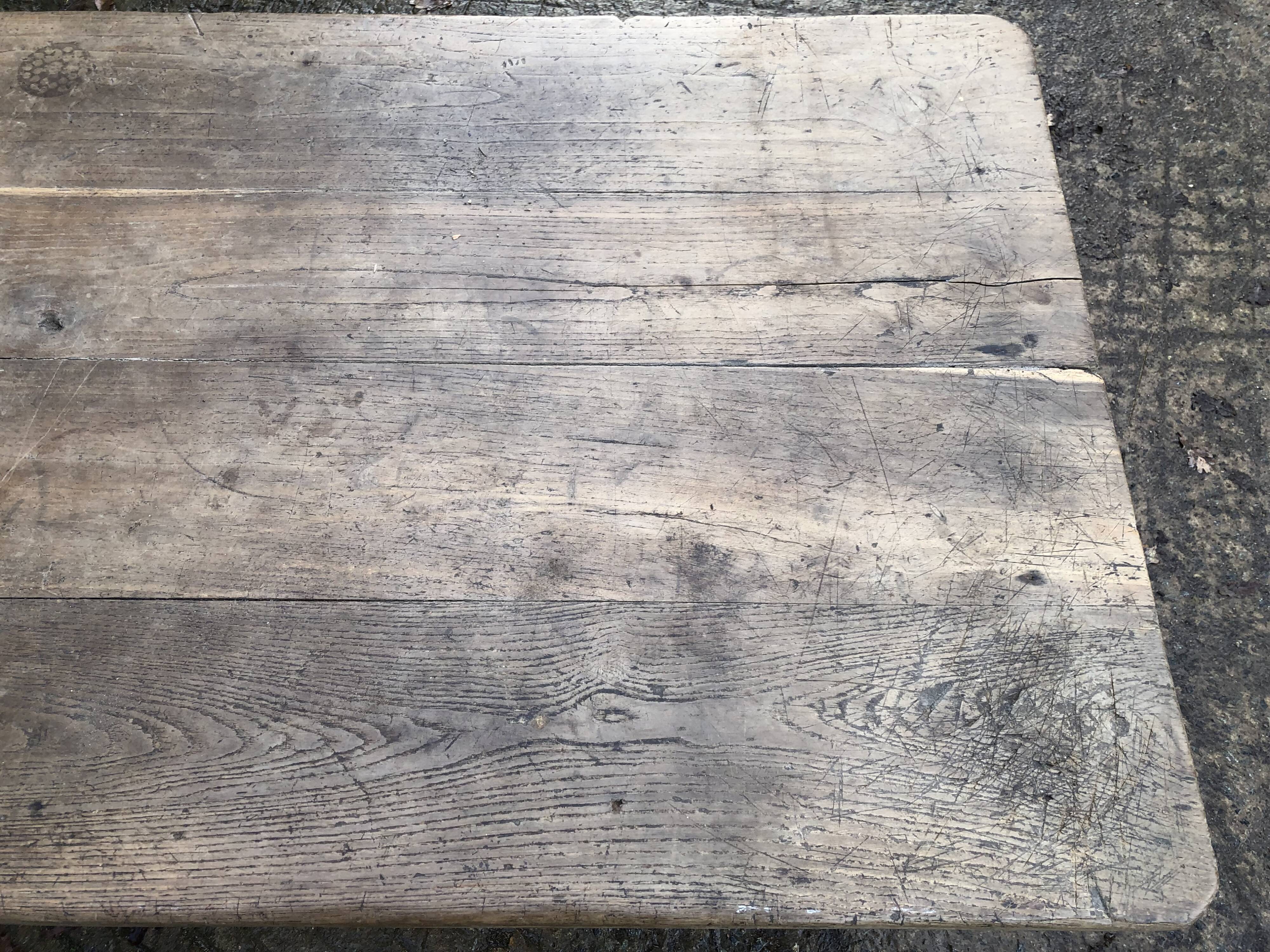 Antique farmhouse table in solid oak with tapered legs and 1 drawer at the end.