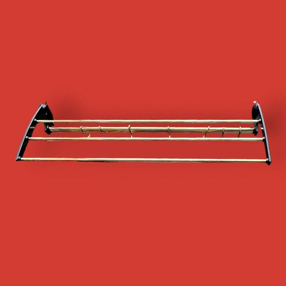Vintage wall-mounted coat rack in black bakelite and brass – 1950s