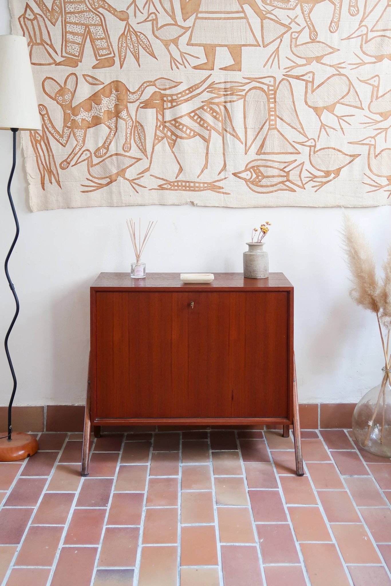 Vintage Scandinavian drop-leaf table in teak wood.