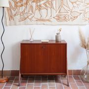 Vintage Scandinavian drop-leaf table in teak wood.