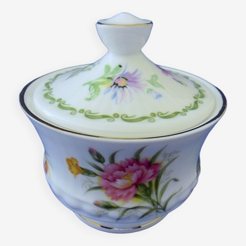 Porcelain sweetener with floral decoration