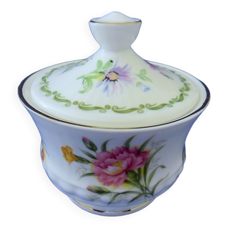 Porcelain sweetener with floral decoration