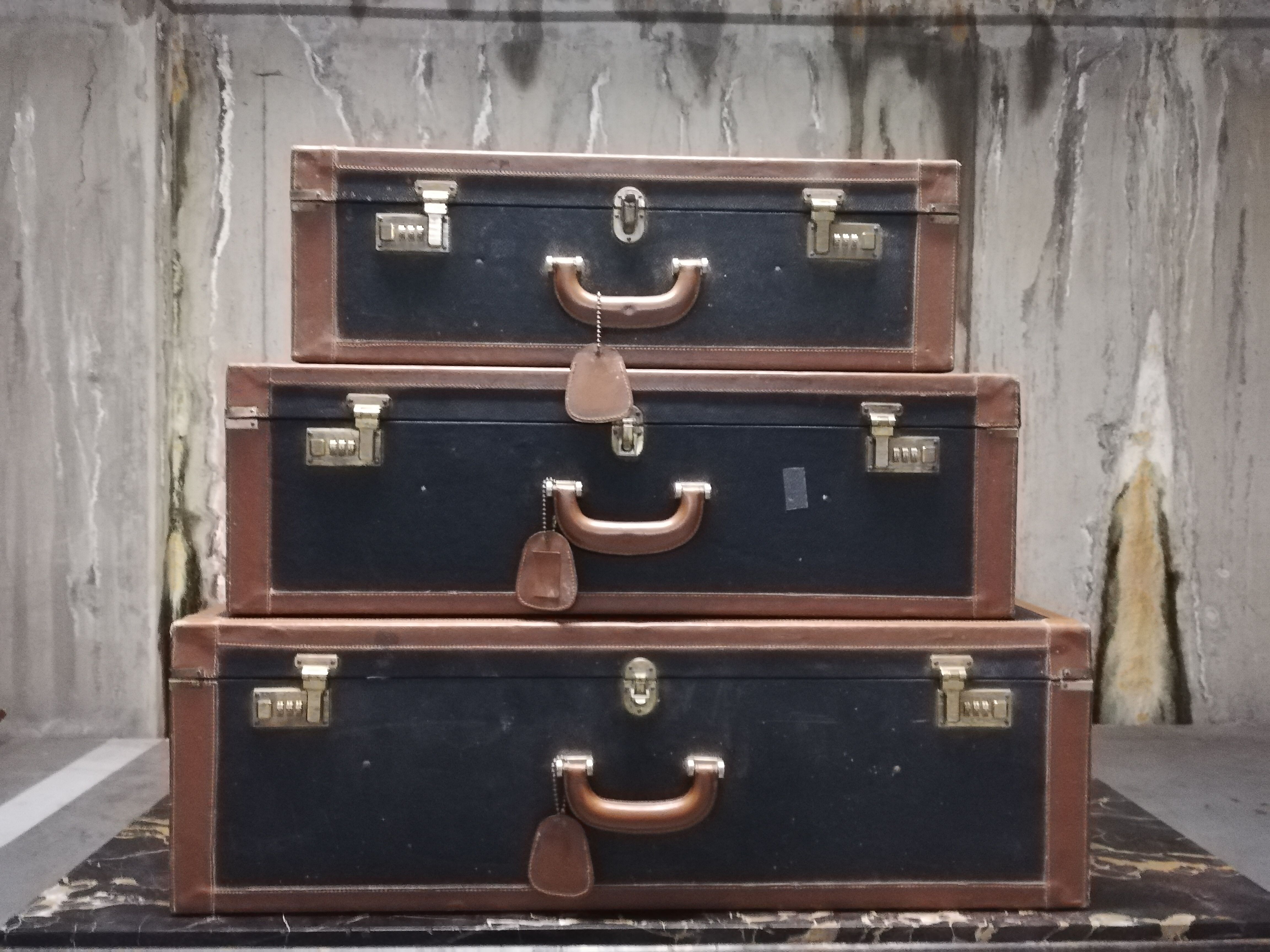Pull-out leather and moleskine suitcases 1960