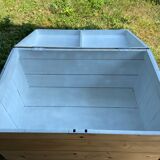 Raw wooden chest with a secret drawer