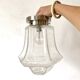 Pair of lantern-style ceiling lights or antique lamps.