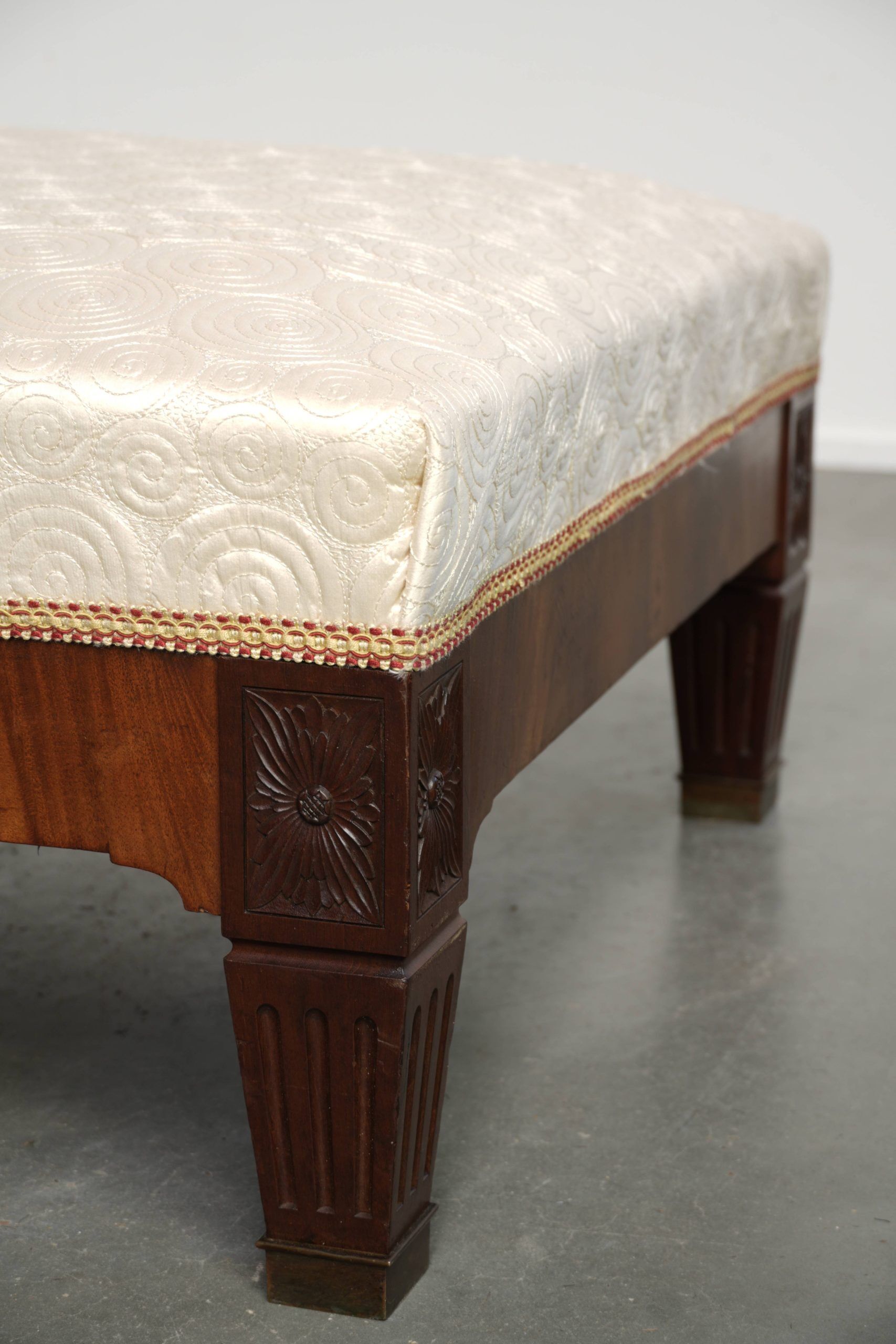 Antique French sofa from the 19th century in Empire style with a silk seat