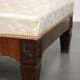 Antique French sofa from the 19th century in Empire style with a silk seat