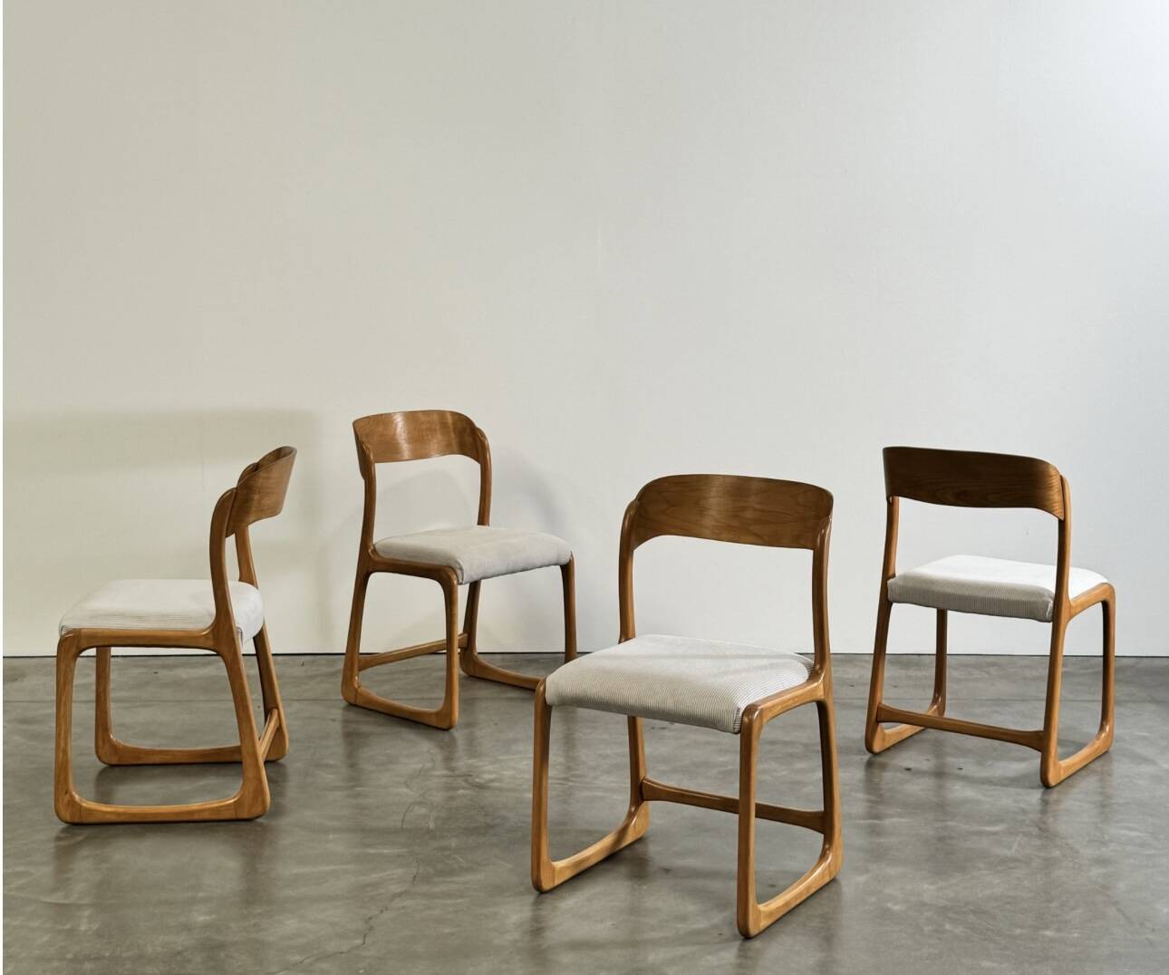 Set of 4 vintage Baumann sled chairs in ecru velvet