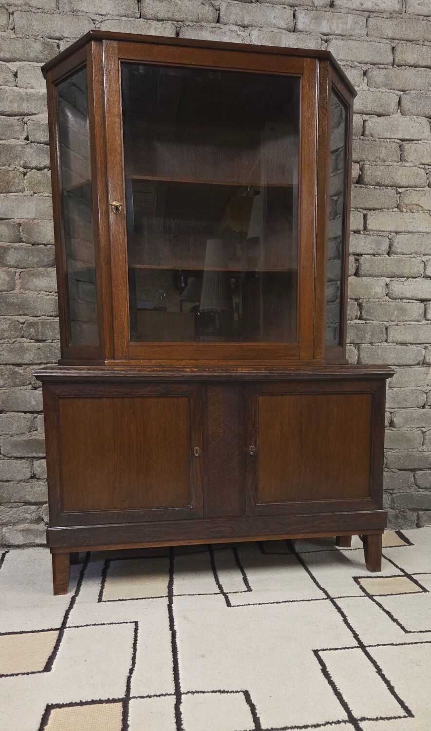 Vintage two-body display cabinet in oak from the 1950s.