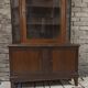 Vintage two-body display cabinet in oak from the 1950s.