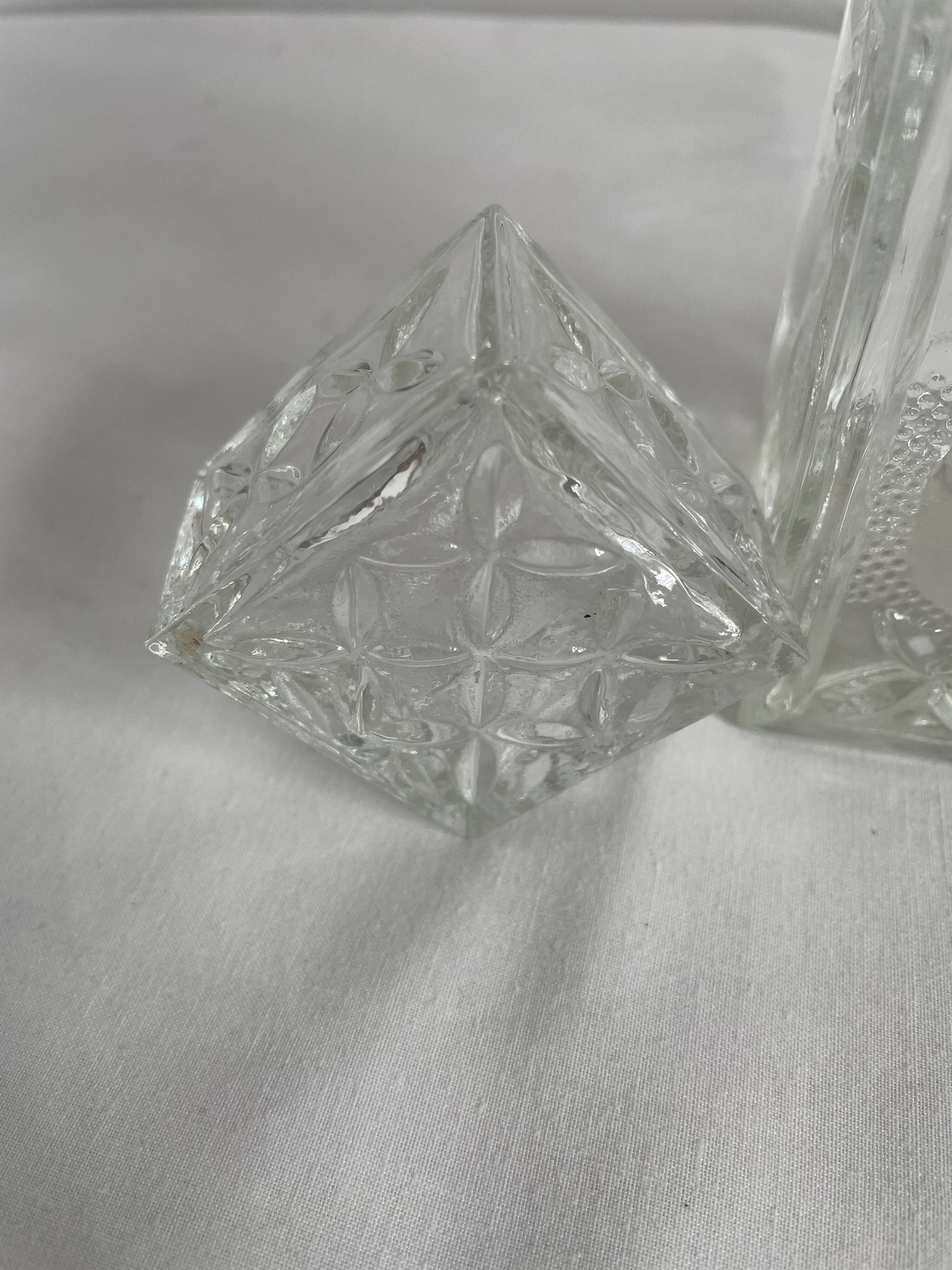 Molded glass carafe, 1960s-1970s, stylized flower decoration, oval, square base, stopper, rosette