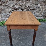 Vintage pine table with drop-leaf extension and turned beech legs, France, 1930s.